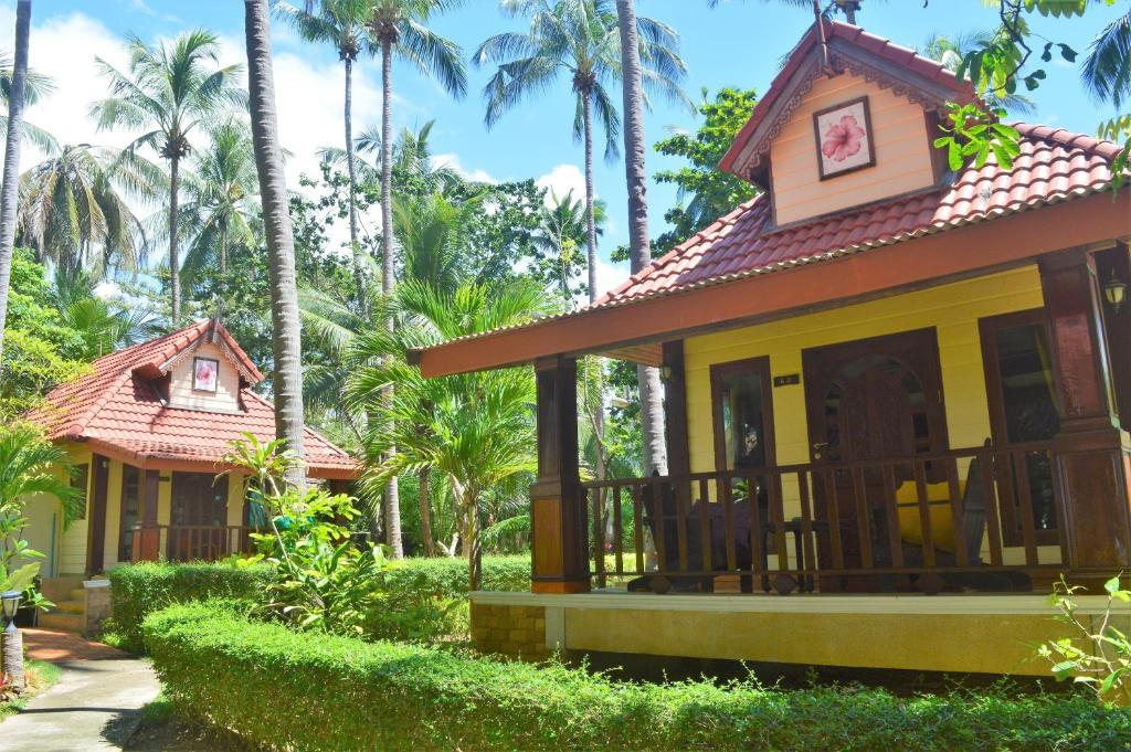 Sayang Beach Resort - Tap to explore photos