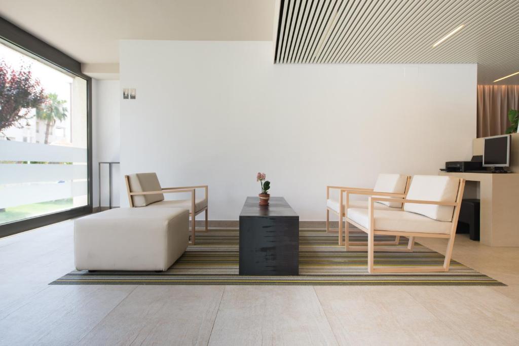 Atenea Park - Suites Apartments - Tap to explore photos