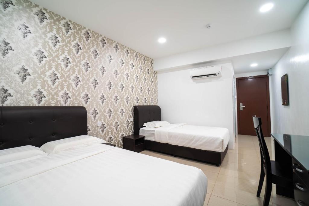 Трехместный (Улучшенный трехместный номер), Crystal Garden Hotel (Tasik Selatan)