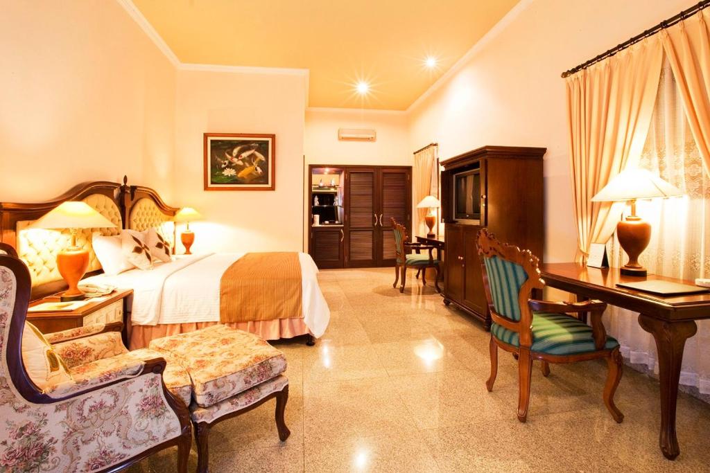 Hotel Puri Asri - Tap to explore photos