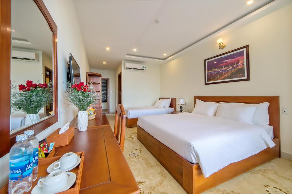 Трехместный (Трехместный номер Делюкс с видом на море), Phuoc My An Beach Hotel