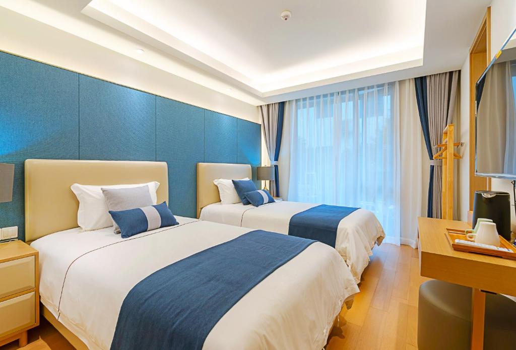 Двухместный (Двухместный номер с 2 отдельными кроватями, вид на сад), Hangzhou Ziwei Boutique Homestay