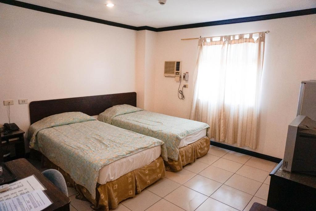 Двухместный (Двухместный номер Делюкс с 2 отдельными кроватями), Crowne Garden Hotel