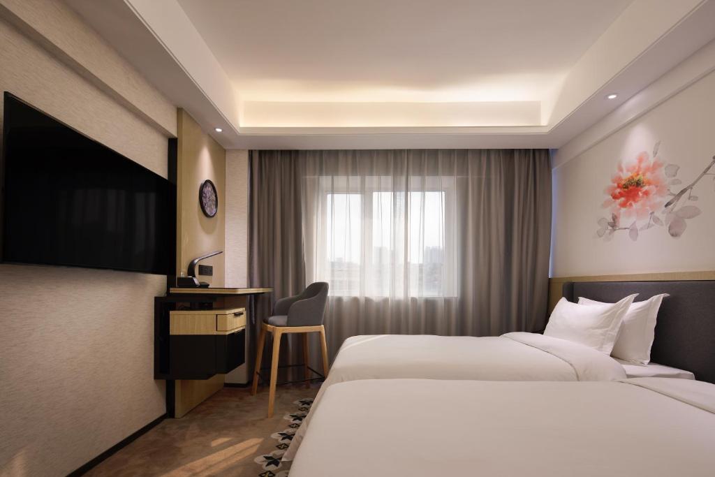 Двухместный (Двухместный номер Делюкс с 2 отдельными кроватями), Paco Business Hotel Jiangtai Metro Station Branch
