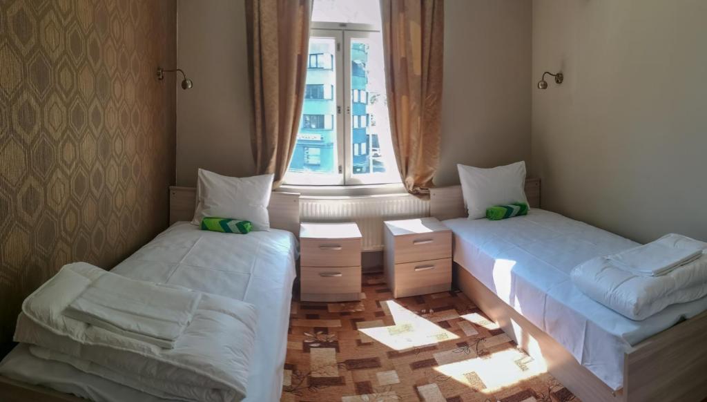 Двухместный (Двухместный номер с 2 отдельными кроватями и общей ванной комнатой), Villa Kadriorg Hostel