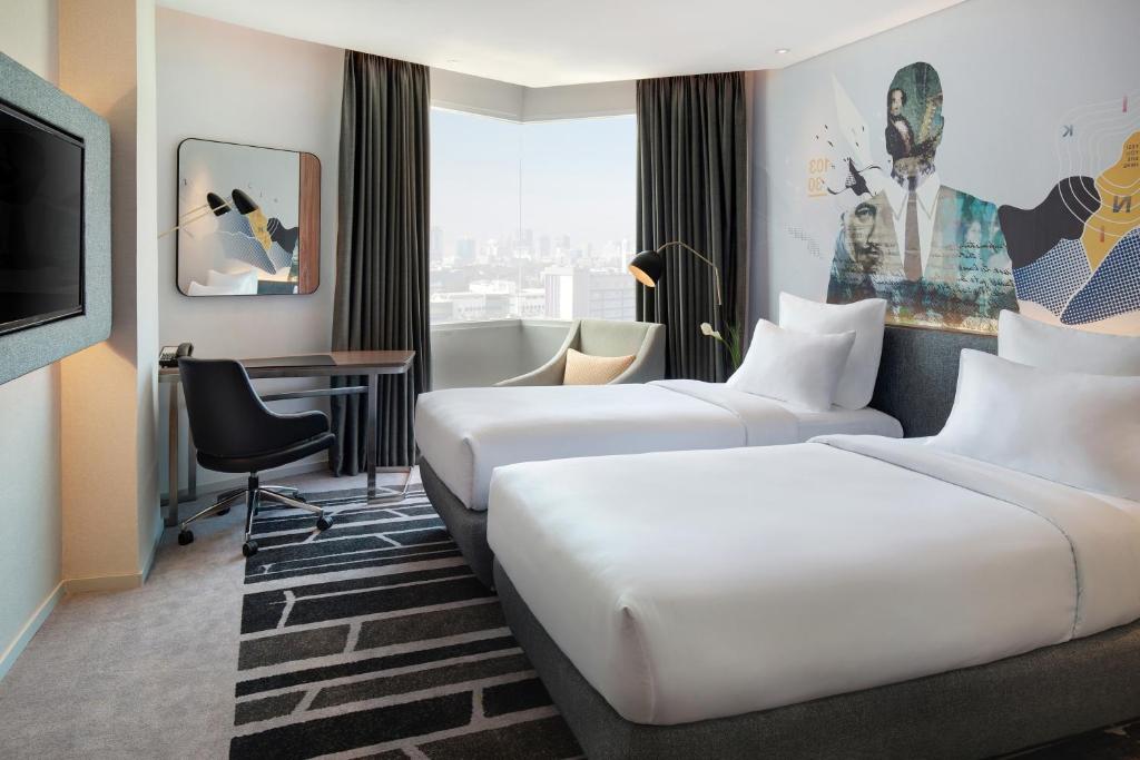 Двухместный (Двухместный номер Делюкс с 2 отдельными кроватями), Novotel Jakarta Cikini