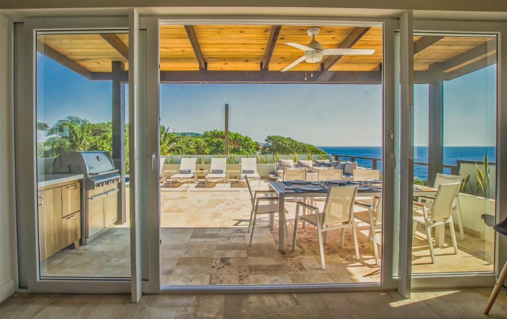 Villa Topaz Above West Bay with 360 Degree Views! 4 Bedroom Option photo 2