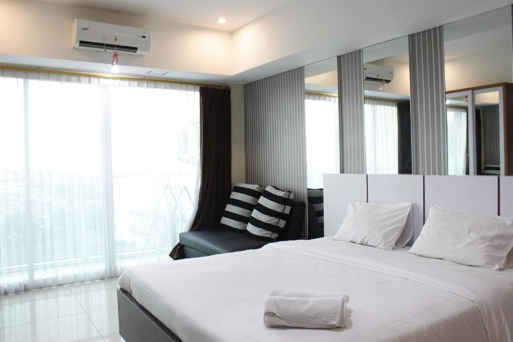 Bright Studio @ Tamansari La Grande Apartment By Travelio, Bandung