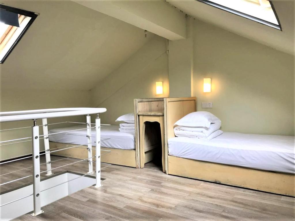 Четырехместный (Двухуровневый четырехместный номер), Wushanyi International Youth Hostel