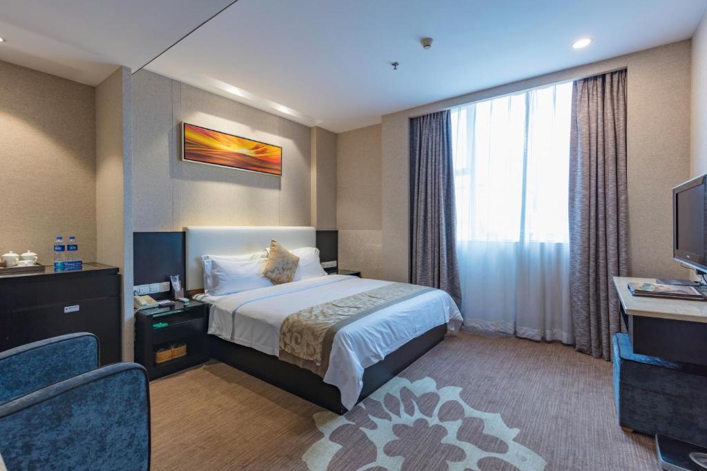 Двухместный (Двухместный номер Делюкс с 1 кроватью), Zhuhai Huayu Jixiang Lou Former Huayu Minfu Hotel