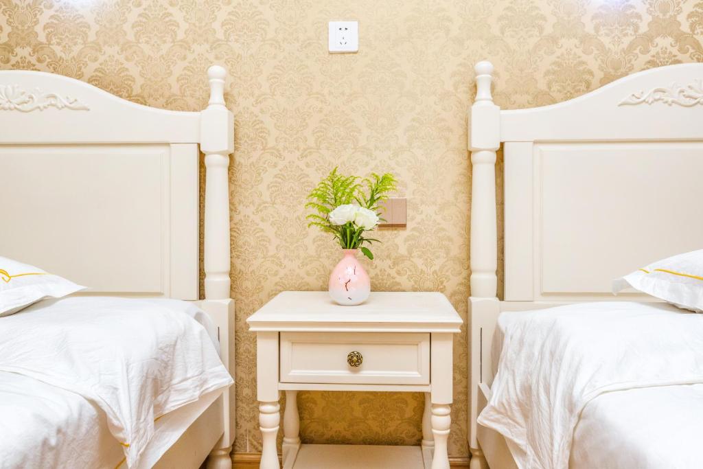 Двухместный (Двухместный номер с 2 отдельными кроватями), Land of Peach Blossom Inn