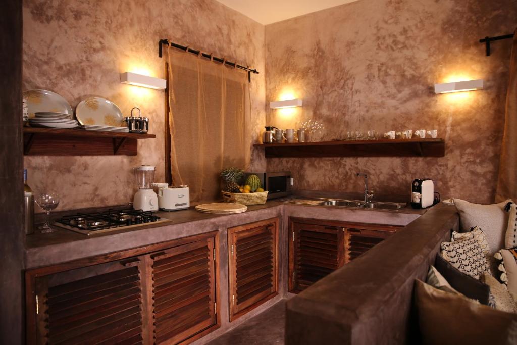 Joya' Beach Suites & Villa - Tap to explore photos