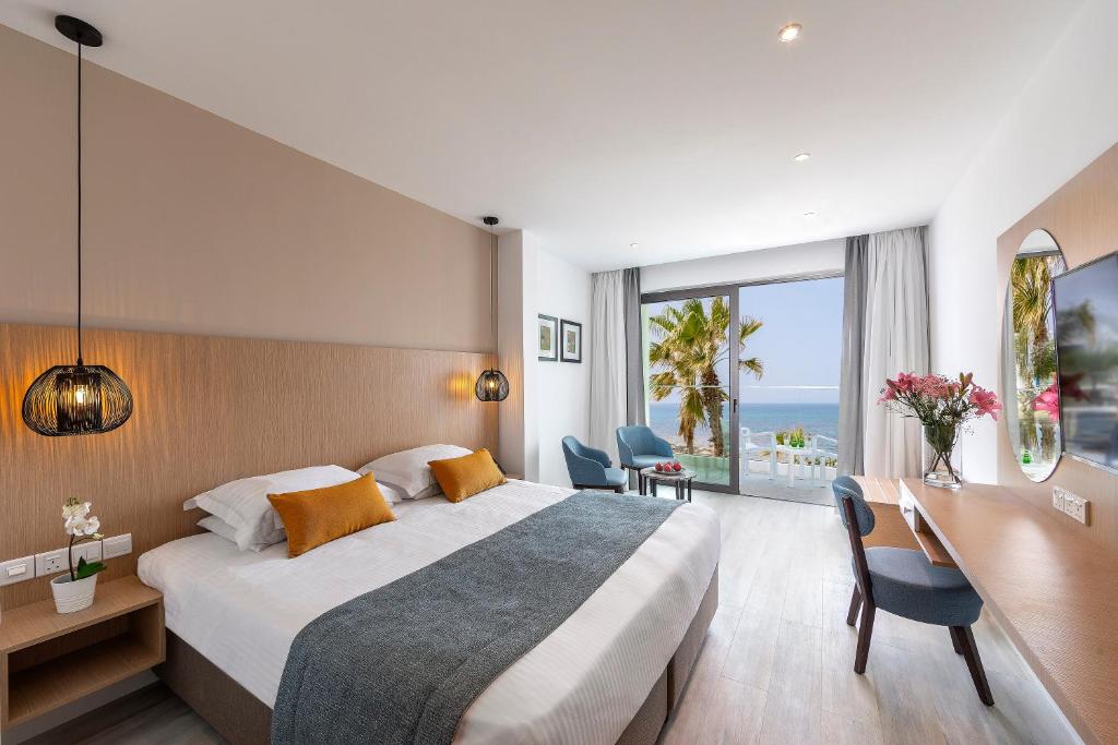 Leonardo Crystal Cove & Spa by the sea - Adults Only - Tap to explore photos
