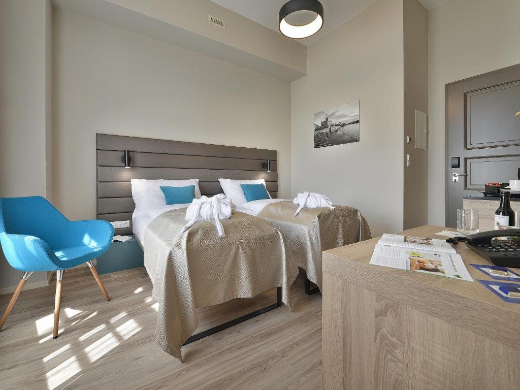 Двухместный (Двухместный номер с 2 отдельными кроватями), EA Hotel New Town