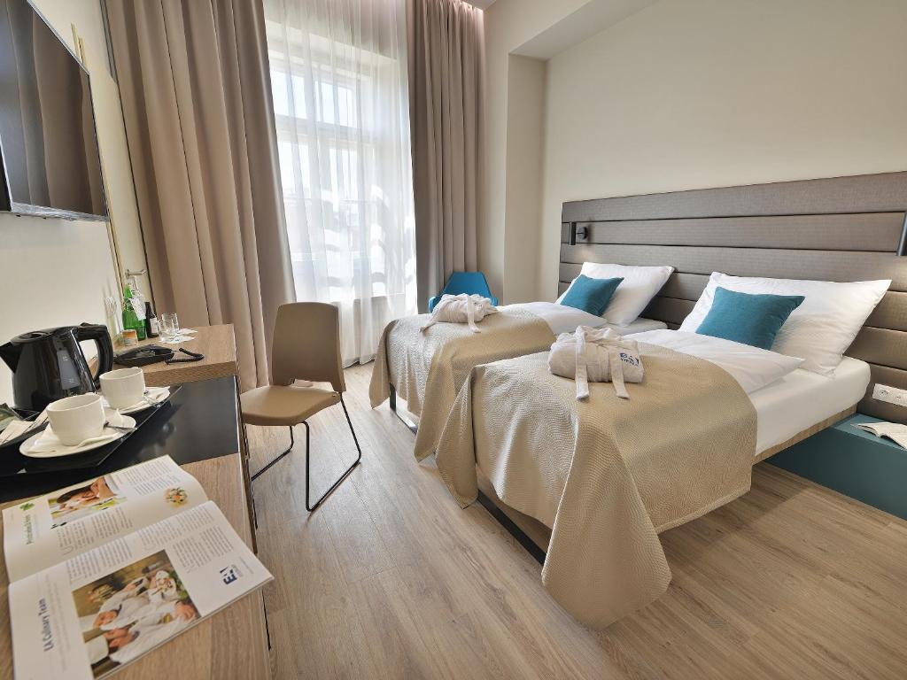 Двухместный (Двухместный номер с 2 отдельными кроватями), EA Hotel New Town