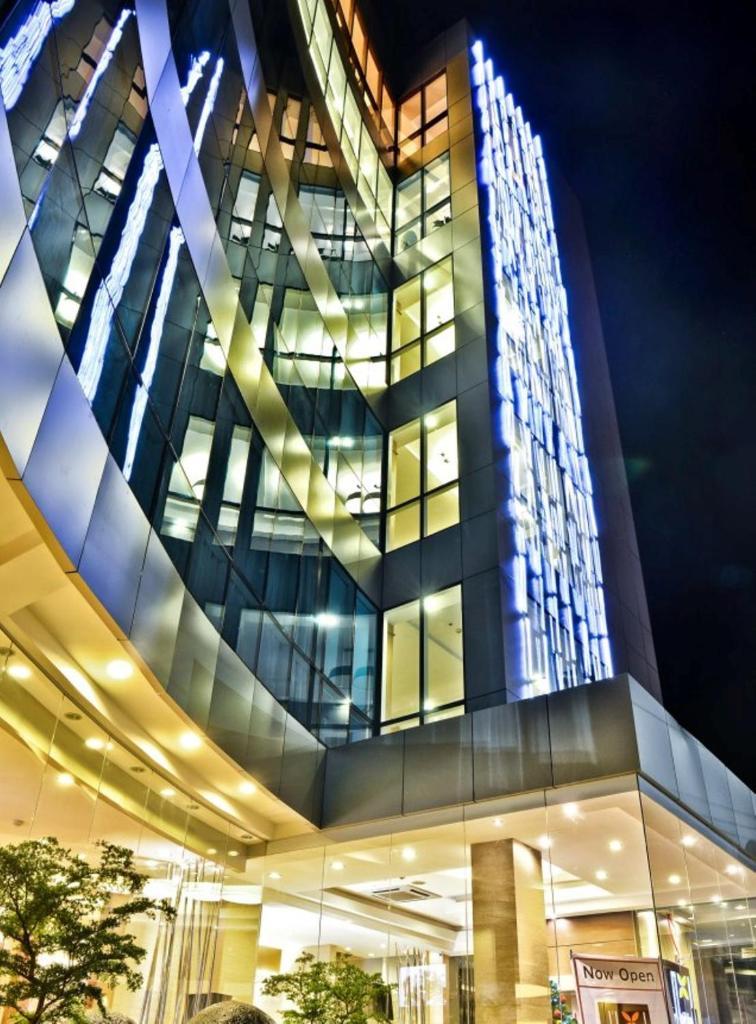 D' Hotel and Suites - Tap to explore photos