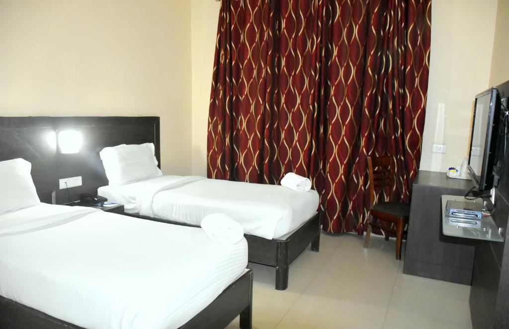 Двухместный (Двухместный номер Делюкс с 2 отдельными кроватями), Hotel City Inn