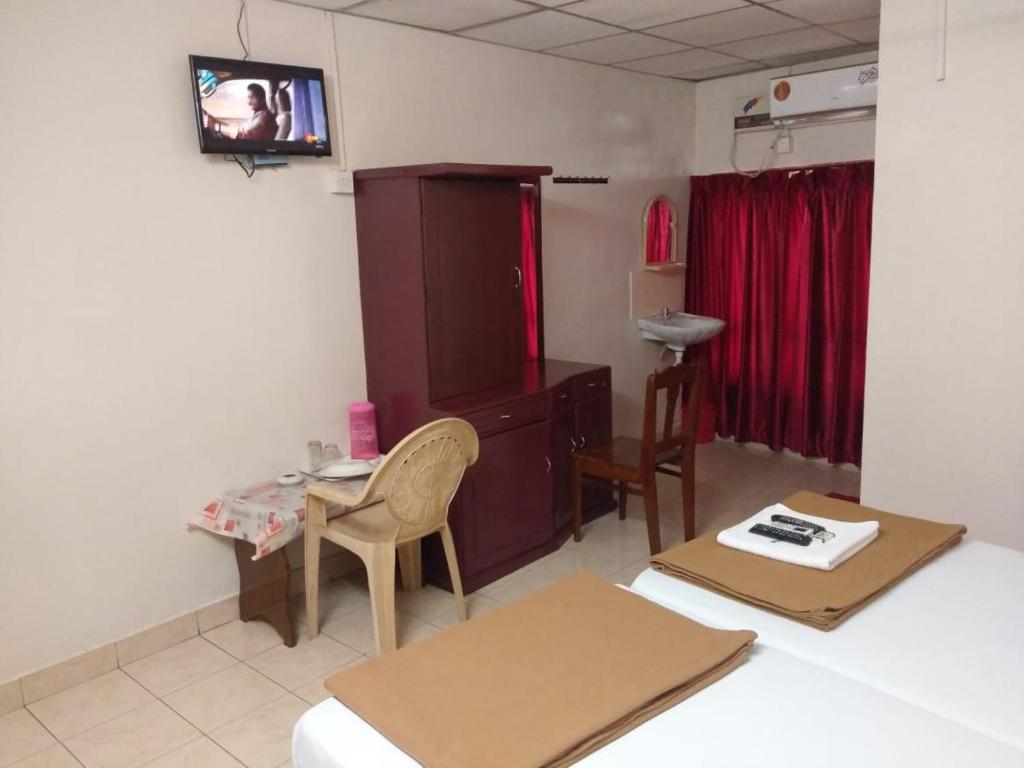 Двухместный (Улучшенный двухместный номер с 1 кроватью), Anandan Tourist Home