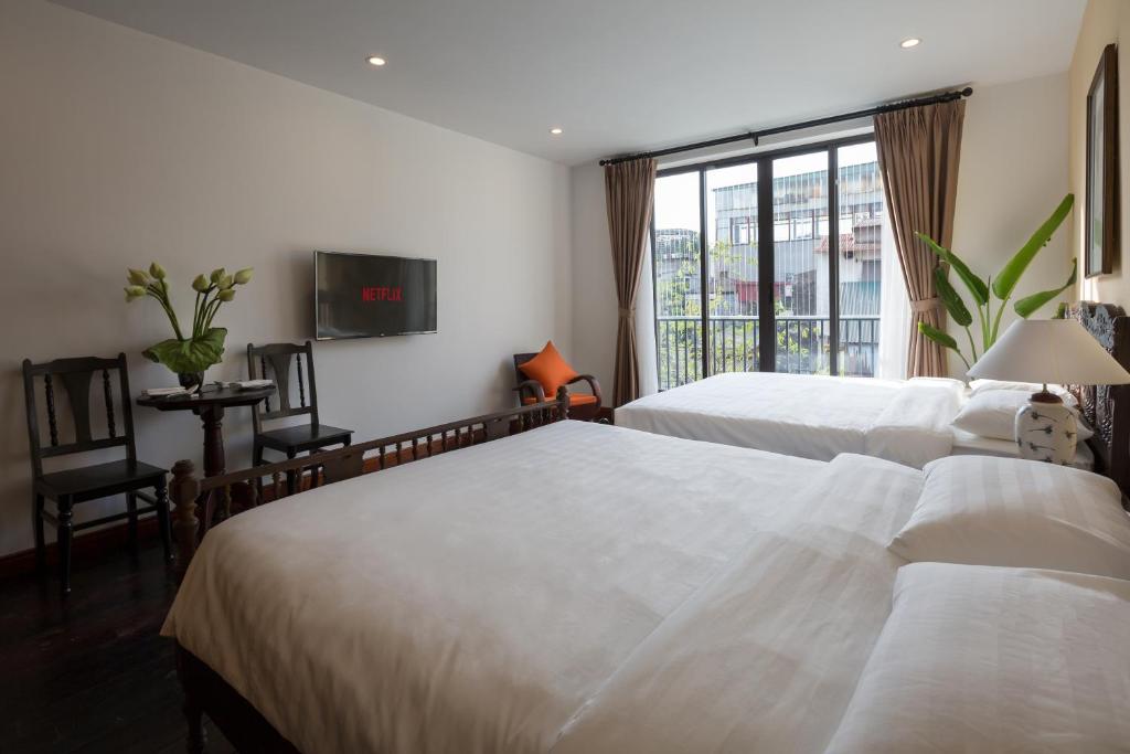 Centraltique Downtown - Bespoke Colonial House Near Hoan Kiem Lake