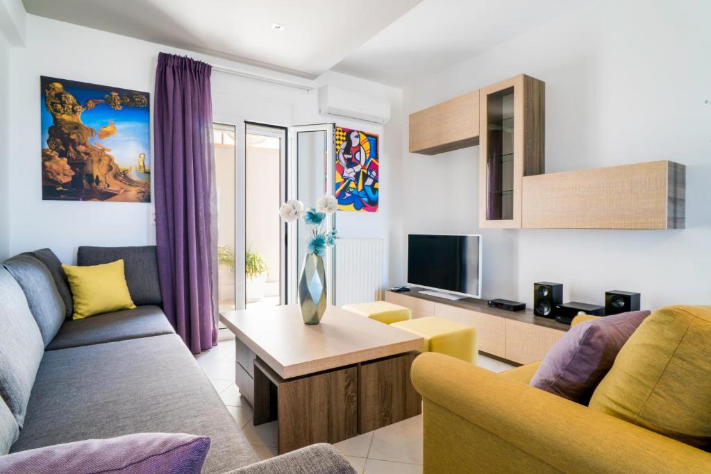 Talos Luxury Suites - Tap to explore photos