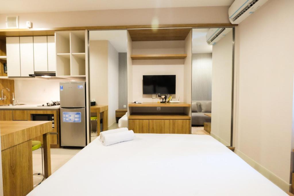 Best Furnished Studio Grand Kamala Lagoon Apartment By Travelio photo 1