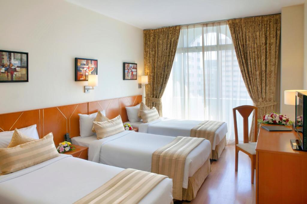 Сьюит (Семейный люкс с 1 спальней с 3 отдельными кроватями), Отель Landmark Hotel