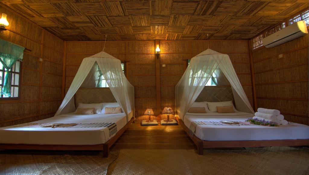 Palm Village Resort & Spa Room Type - Bamboo House