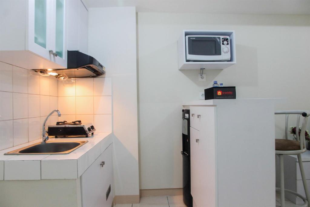 Exclusive 2BR Springlake Summarecon Bekasi Apartment By Travelio photo 4