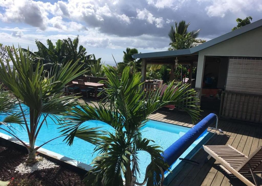 Bungalow cosy avec piscine surplombant l'océan photo 1