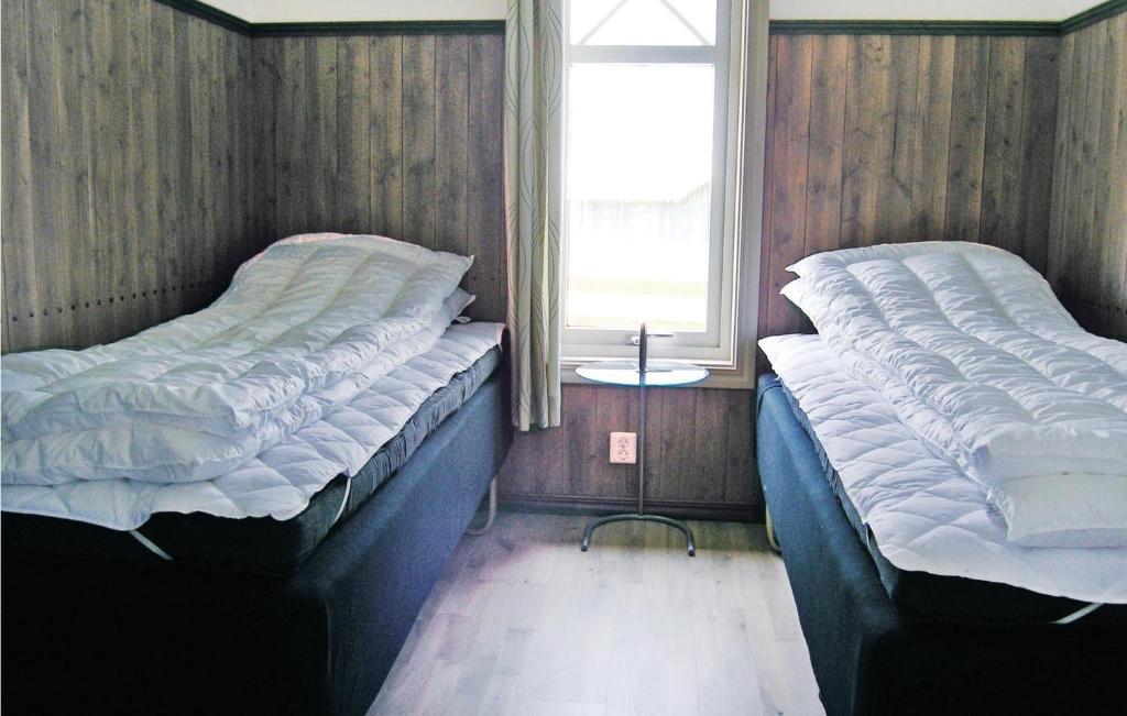 Amazing home in Vittaryd with 4 Bedrooms, Sauna and WiFi photo 1