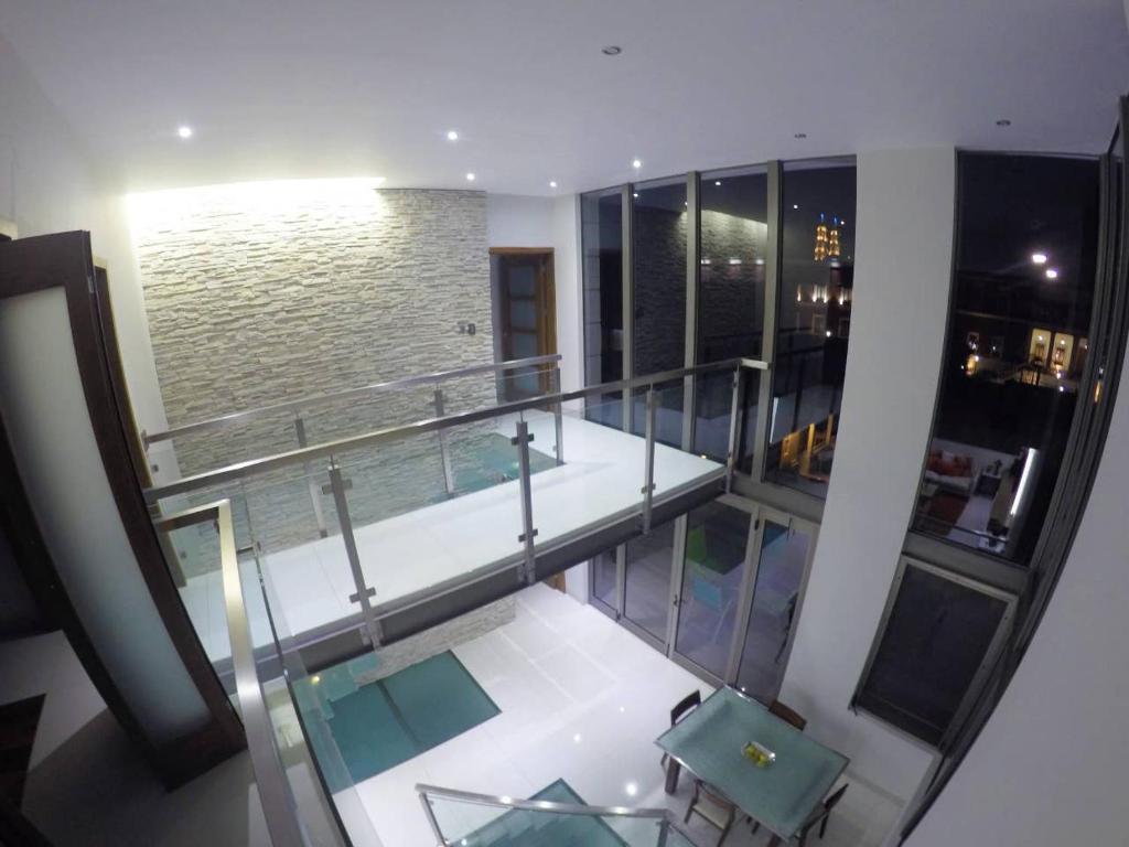 En el Centro Penthouse Lujo AC WiFi 300mbps - Tap to explore photos