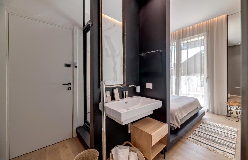 Le Palmette Suites - Tap to explore photos
