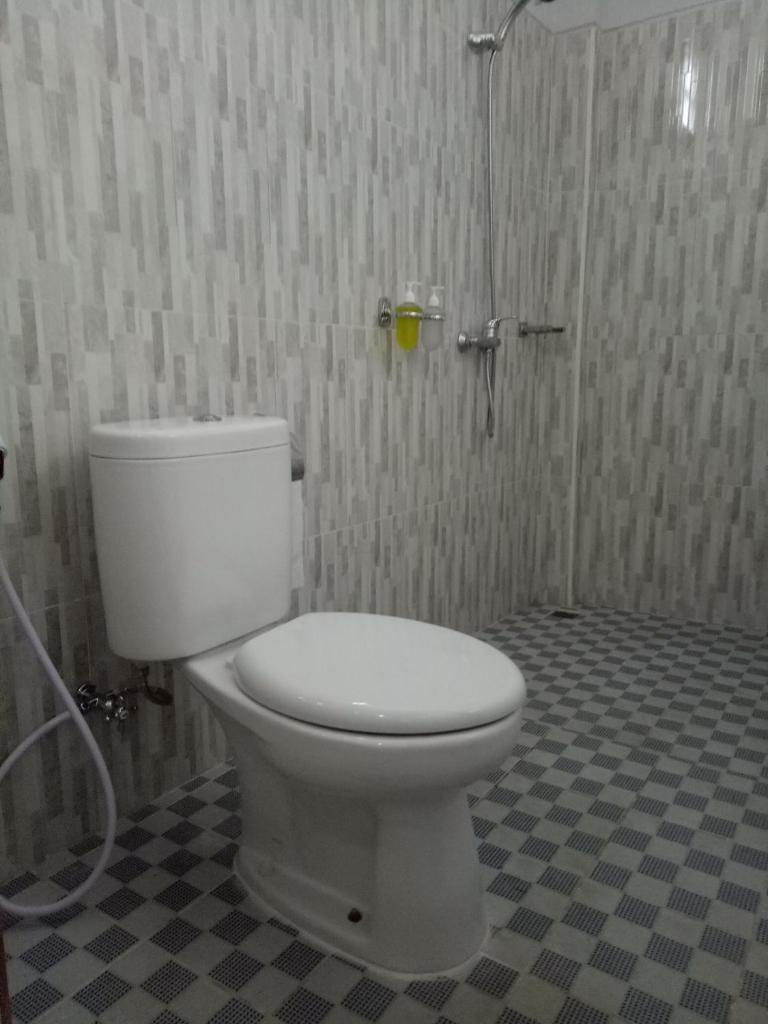Двухместный (Двухместный номер Делюкс с 2 отдельными кроватями), Suryadina Guest House