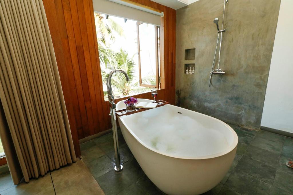 Двухместный (Номер Делюкс с видом на океан и ванной), Ubuntu Boutique Hotel by Lantern
