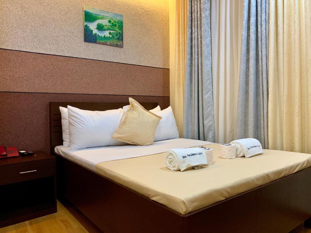 Двухместный (Улучшенный двухместный номер с 1 кроватью), Davao Persimmon Suites
