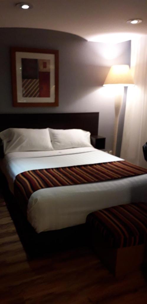 Двухместный (Просторный двухместный номер с 2 отдельными кроватями), Hotel Mexicali