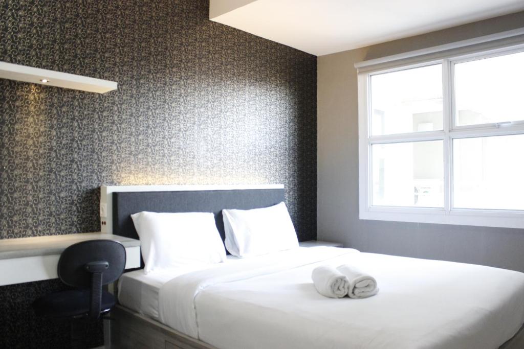 Quiet 2BR Apartment @ Parahyangan Residence Apartement with Mountain View By Travelio