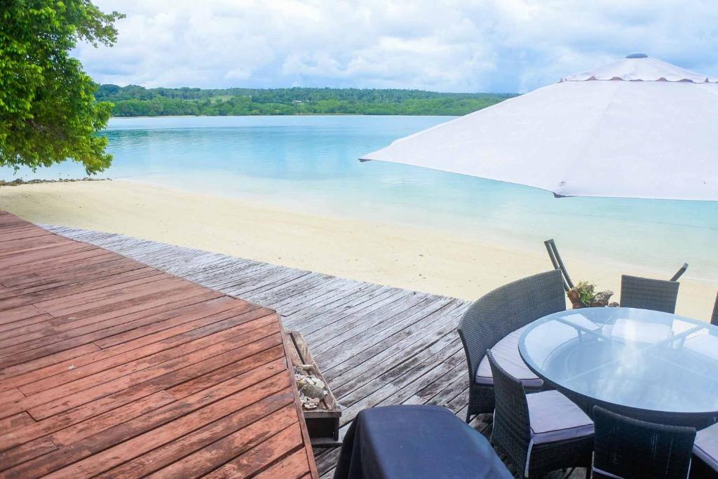 Santo Sunset Beach Villas on Surunda Bay photo 2