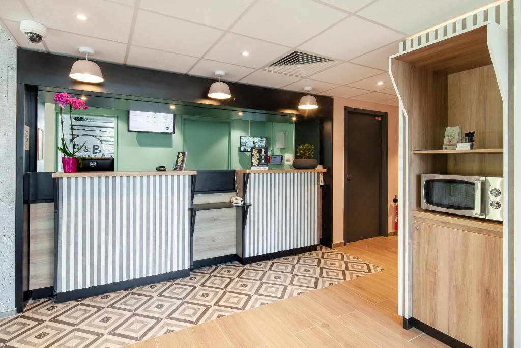 B&B HOTEL Igny Palaiseau - Tap to explore photos