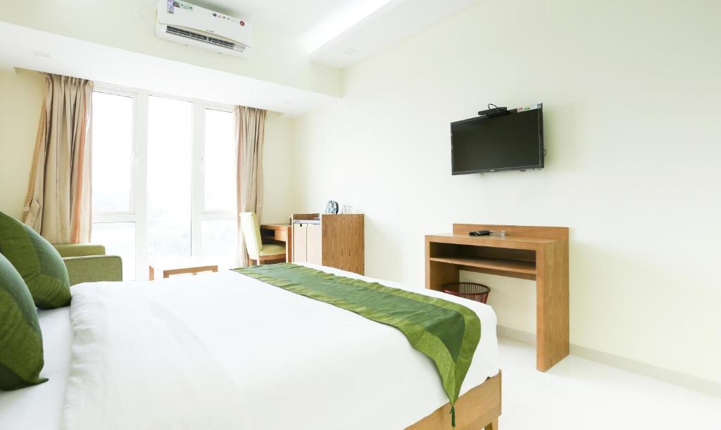 Двухместный ([Sanitized] Deluxe Double Room), Treebo The Galaxy