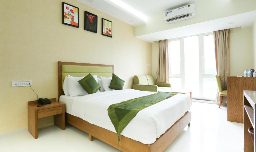 Двухместный ([Sanitized] Deluxe Double Room), Treebo The Galaxy