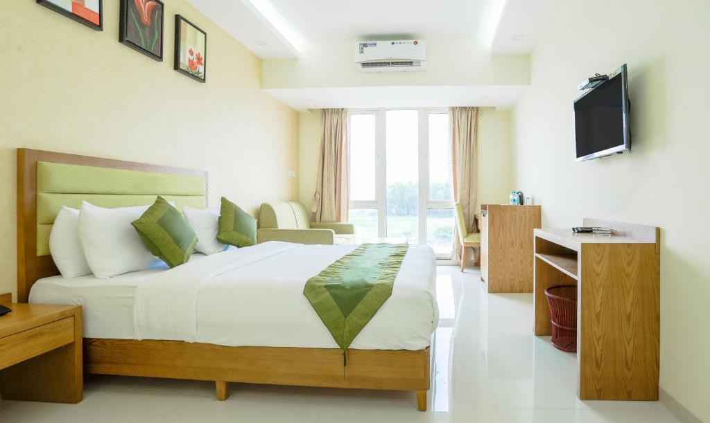 Двухместный ([Sanitized] Deluxe Double Room), Treebo The Galaxy