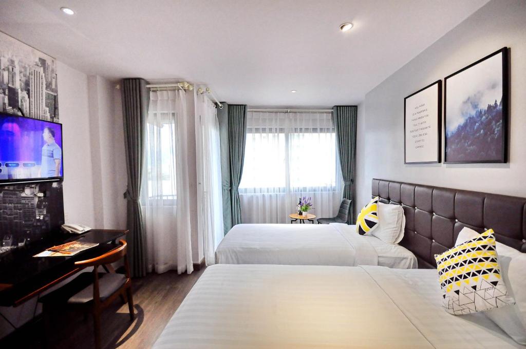 Двухместный (Двухместный номер с 2 отдельными кроватями и окном), King Homestay Hotel with terrace