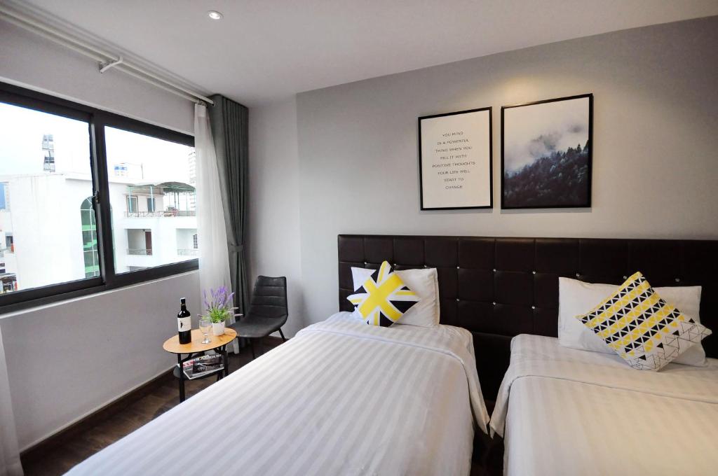 Двухместный (Двухместный номер с 2 отдельными кроватями и окном), King Homestay Hotel with terrace
