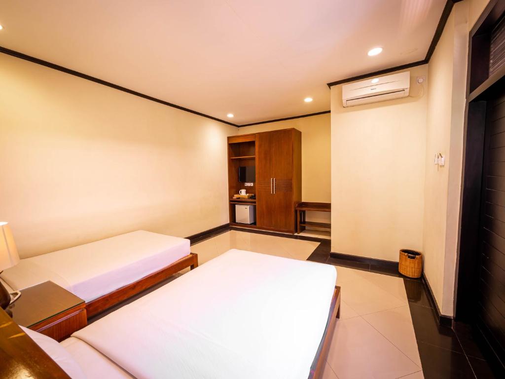 Двухместный (Deluxe Interconnecting Room with Garden View), Yulia Beach Inn Kuta
