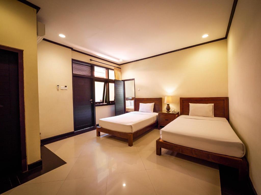 Двухместный (Deluxe Interconnecting Room with Garden View), Yulia Beach Inn Kuta