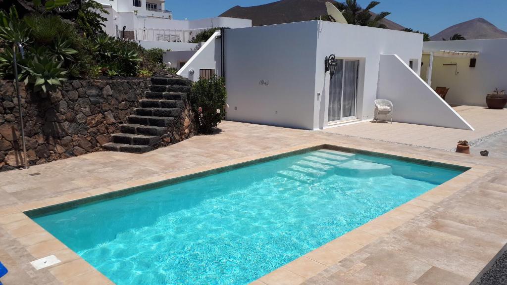 Villa Essence - a unique detached villa with heated private pool, hottub, gardens, patios and stunning views! photo 1