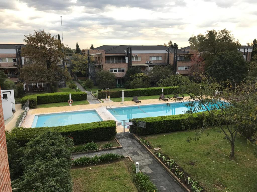 Apartamento en Country Pilar Piscina Parrilla propia hasta 4 personas photo 1