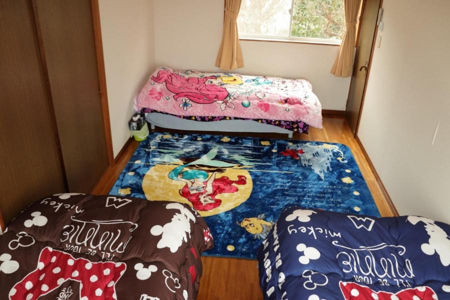 陽のあたる宿 サンセットパーム Room Type - Standard Triple Room with Sea View