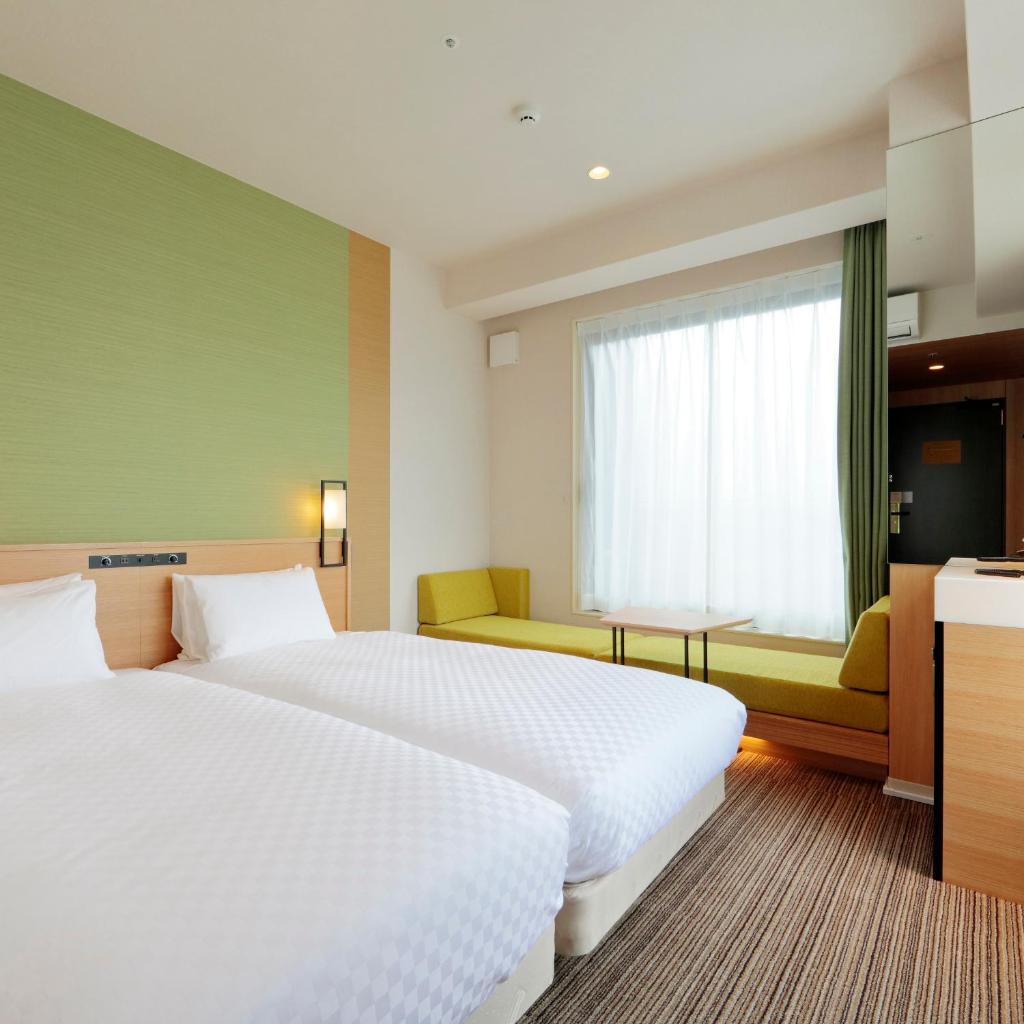 Candeo Hotels Osaka Kishibe - Tap to explore photos